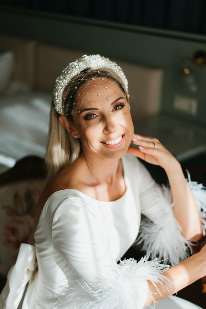 Luna Wedding Headpiece by Eva Oherjus Design- Handcrafted bridal accessory with freshwater pearls, Swarovski crystals, and Italian silk. Perfect for elegant weddings.