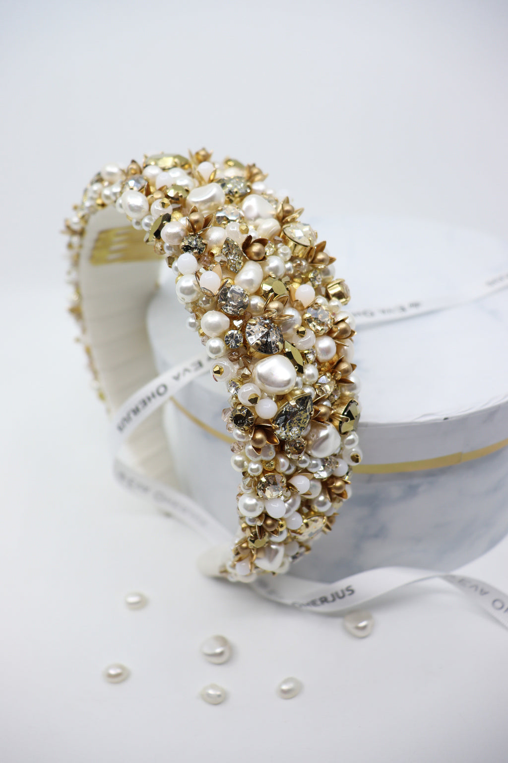 Grace Couture Head Crown by Eva Oherjus- Luxurious ivory silk adorned with Swarovski crystals, freshwater pearls, and dazzling beads. A masterpiece of elegance for your special day.