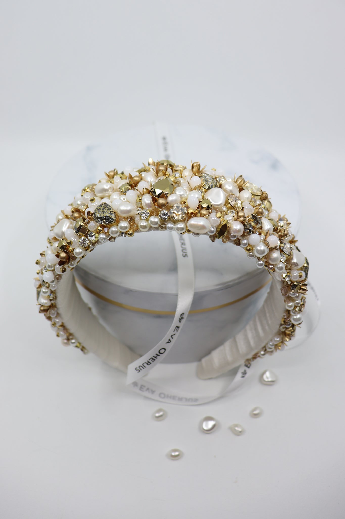 Grace Couture Head Crown - Opulent ivory silk adorned with Swarovski crystals, pearls, and radiant beads. Handcrafted elegance for an unforgettable bridal look.